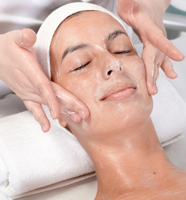 woman receiving a facial